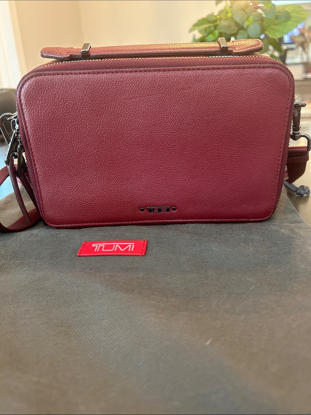 Good Condition Tumi Pebbled Leather Crossbody in Deep Berry Red